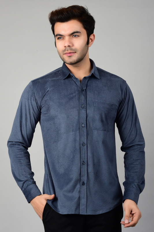 4400bc Model Wearing a velvet Blue shirt, crafted from luxurious velvet fabric, exuding sophistication and timeless elegance with its refined silhouette.