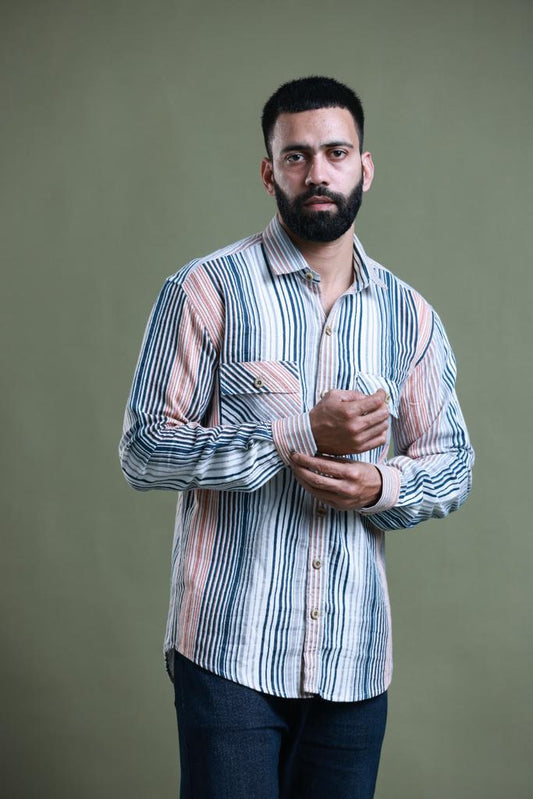 4400bc Model Wearing A classic shirt made of corduroy fabric, featuring Multi colors stripes and full-length sleeves, offering comfort and timeless elegance.